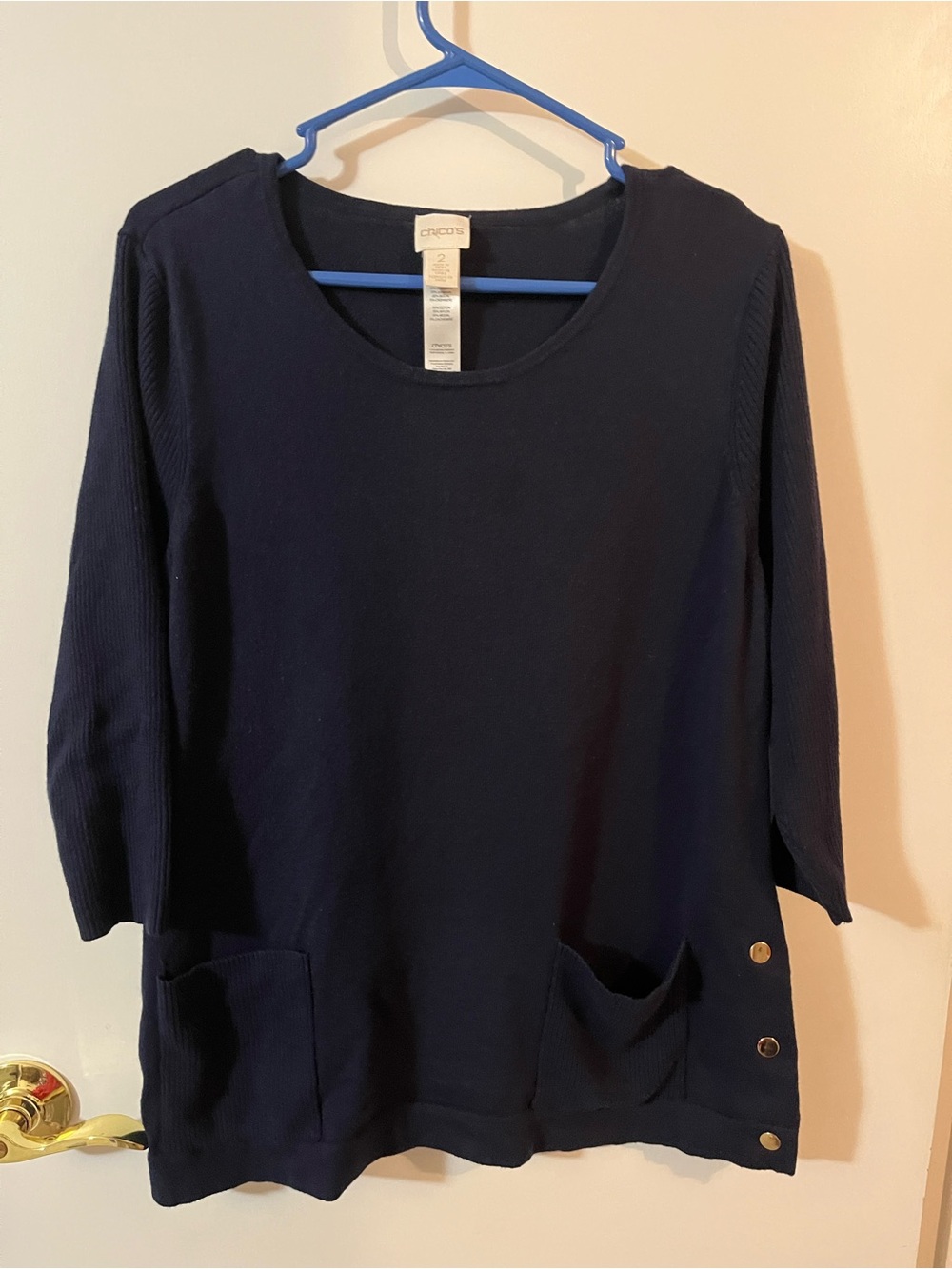 Chico's size 2 (12 L) Navy Long-Sleeve Knit Top with Pocket & snap Accents
